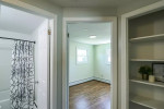 brand new Stainless Steel Appliances(2025), bar height breakfast bar, dining area, laundry storage room