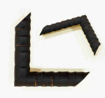 Unusual embossed wooden frame in black, 1.1 inches wide, 0.9 inches high.