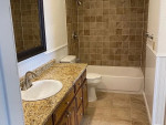 Recently updated spacious 2 bedroom duplex split with small patio and yard.