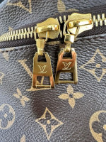 LV Monogram Bumbag as I hardly use it.   This bag is Made in France, has pristine interior and corners / used a handful of times.  Comes with dustbag, box, and ribbon Price $1300