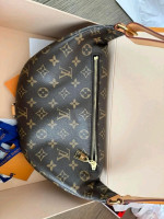 LV Monogram Bumbag as I hardly use it.   This bag is Made in France, has pristine interior and corners / used a handful of times.  Comes with dustbag, box, and ribbon Price $1300