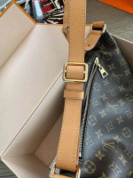 LV Monogram Bumbag as I hardly use it.   This bag is Made in France, has pristine interior and corners / used a handful of times.  Comes with dustbag, box, and ribbon Price $1300