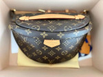 LV Monogram Bumbag as I hardly use it.   This bag is Made in France, has pristine interior and corners / used a handful of times.  Comes with dustbag, box, and ribbon Price $1300