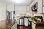 This fantastic 1bed 1baths condo features a huge 1.5 stall garage