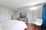 This fantastic 1bed 1baths condo features a huge 1.5 stall garage