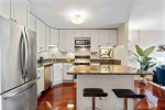 This fantastic 1bed 1baths condo features a huge 1.5 stall garage