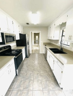 This lovely house features new carpet and paint throughout, along with new fixtures to add a fresh touch.