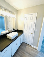 This lovely house features new carpet and paint throughout, along with new fixtures to add a fresh touch.