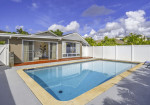 This home-away-from-home exudes island style and comfort!
