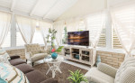 This home-away-from-home exudes island style and comfort!