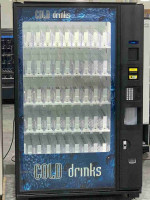 Dixie Narco 501E soda vending machine 7up graphic