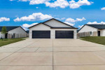 Welcome to this stunning, newly built twin home, perfect for those seeking modern living in a comfortable setting.