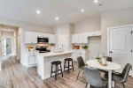 Welcome to this stunning, newly built twin home, perfect for those seeking modern living in a comfortable setting.