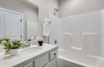 Welcome to this stunning, newly built twin home, perfect for those seeking modern living in a comfortable setting.