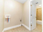 This cozy 3 bedroom, 2 bath home features a large backyard