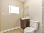 This cozy 3 bedroom, 2 bath home features a large backyard