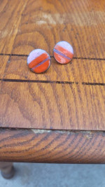 Red and white clip on earrings