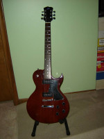 SX LP studio w/ P90's set neck with gig bag.