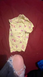 Yellow flower print crop top.