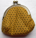 brown fabric purse metal frames and clasp
