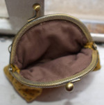 brown fabric purse metal frames and clasp