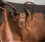 Lady' purses: Gucci, Michael Kors, Prada