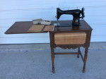NICE VINTAGE NEW HOME LIGHT RUNNING SEWING MACHINE ORNATE WOOD CABINET