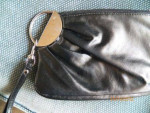 Purse--small black leather, silver trim, wrist strap. Perfect cond.