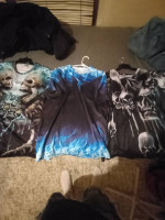 2 Skull shirts. 1 Blue Flames Unique shirt. Must see! Excellent!