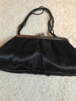 Black evening purse with beaded carry handle or shoulder strap