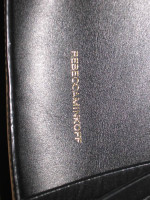 Rebecca Minkoff Sofia Backpack, black leather w/ multi-color tassle