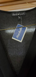 Ladies clothing items with tags still on them