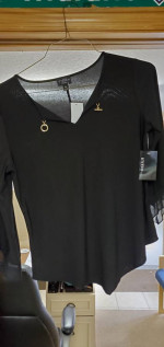 Ladies clothing items with tags still on them