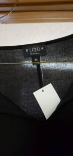Ladies clothing items with tags still on them