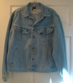 Unisex, NEW, Denim Jacket says “Serious Music” embroidered on back,Med