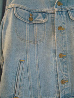 Unisex, NEW, Denim Jacket says “Serious Music” embroidered on back,Med