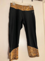 N.Y.L leggings with the animal print on the sides and the top, size M