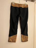 N.Y.L leggings with the animal print on the sides and the top, size M