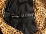 N.Y.L leggings with the animal print on the sides and the top, size M