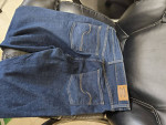 $20 BAG CLOTHES LEVIS, MAURICES, ETC