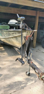 Old fishing boat, motor, trailer