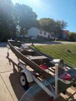 Boat motor and trailer