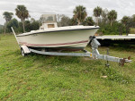 Wellcraft 18 ft open fisherman with trailer