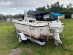 Wellcraft 18 ft open fisherman with trailer