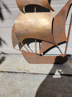 Steel sailboat decoration. 50" tall, by 28" wide.