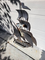 Steel sailboat decoration. 50" tall, by 28" wide.