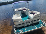BEAUTIFUL SUNDANCER PONTOON BOAT IN WATER NOW COME SEE IT