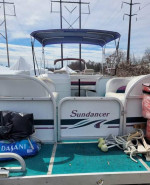 BEAUTIFUL SUNDANCER PONTOON BOAT IN WATER NOW COME SEE IT