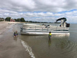 1997 Premier Pontoon w/new 90hp Motor