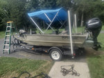 2006 1448 Fisher aluminum boat w/ 25 hp 4 Stroke motor.